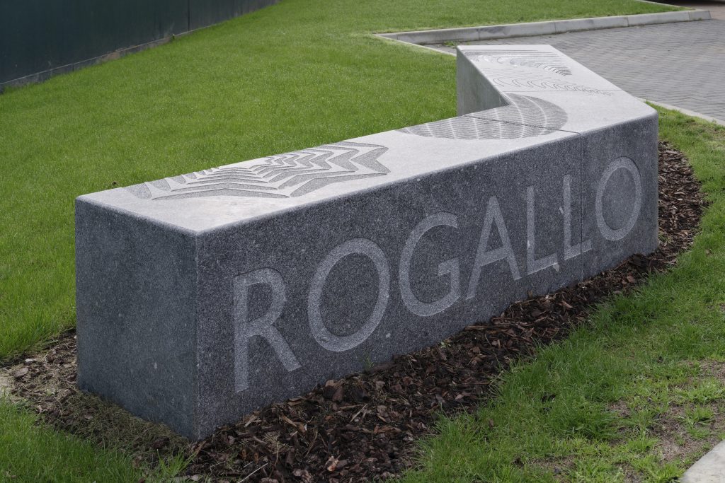 Granite sculptural bench with sandblasted text and pattern